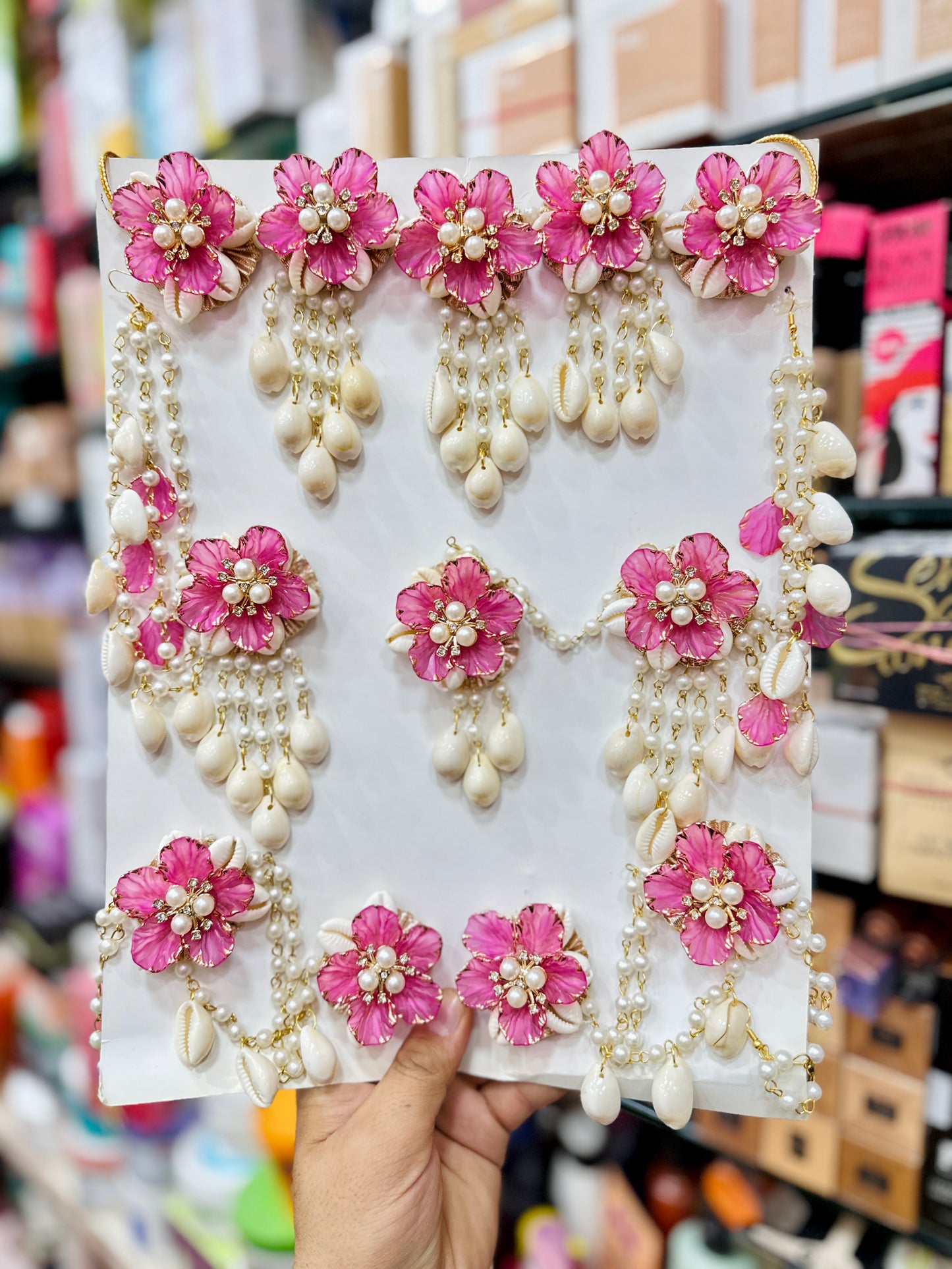Enchanting Blossoms and Cowrie Dark Pink Shells Floral Jewellery Set.
