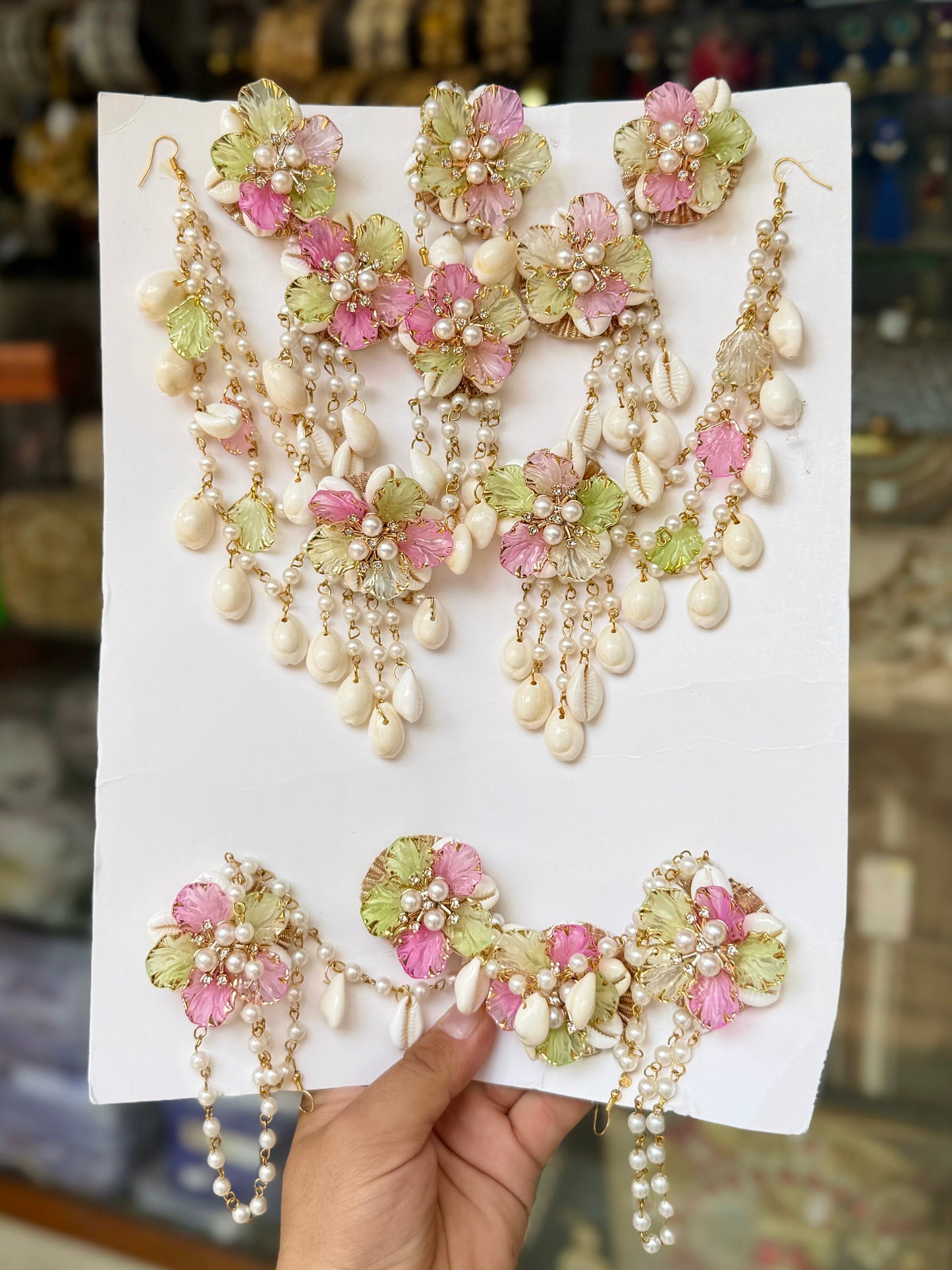 Ethereal Blooms & Coastal Harmony: Light Pink, Pista, and Pearl Floral  with Hand-picked Cowrie Shells Jewellery Set.